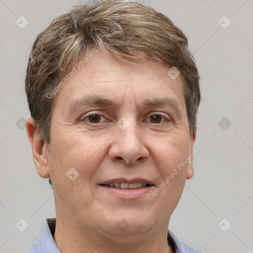 Joyful white adult male with short  brown hair and brown eyes