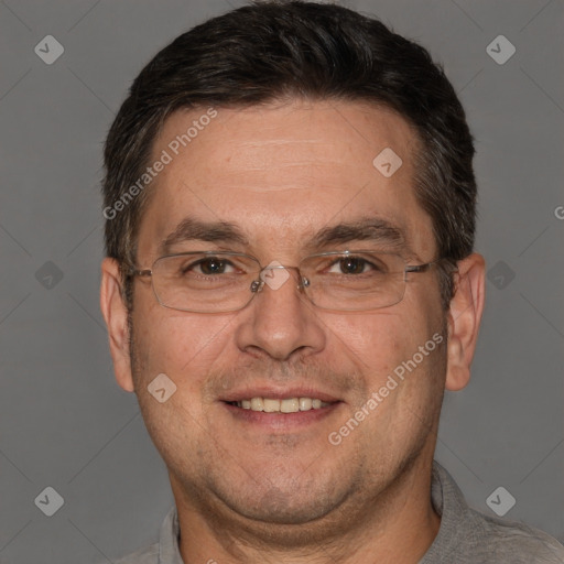 Joyful white adult male with short  brown hair and brown eyes