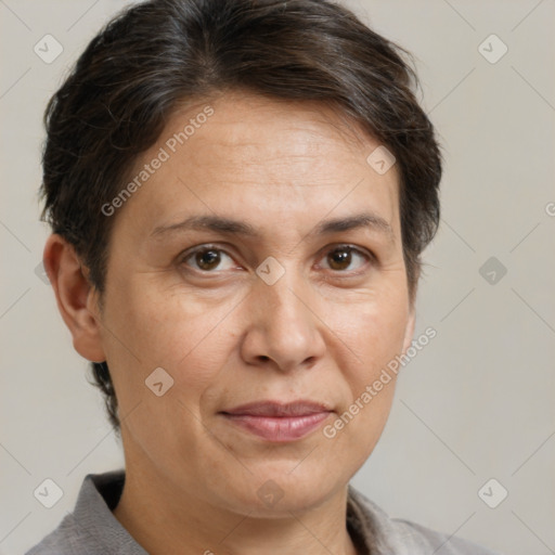 Joyful white adult female with short  brown hair and brown eyes