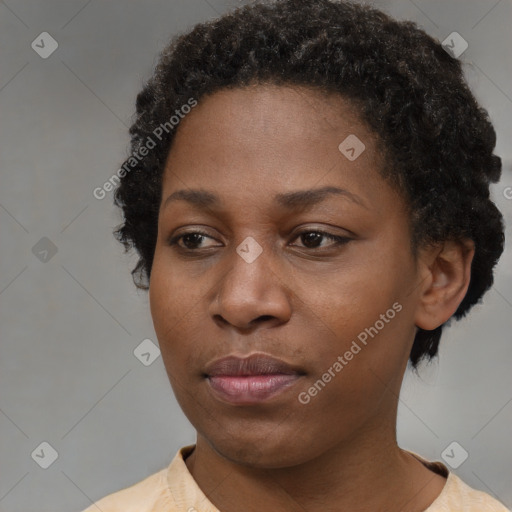 Neutral black young-adult female with short  brown hair and brown eyes