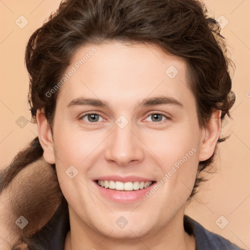 Joyful white young-adult male with medium  brown hair and brown eyes