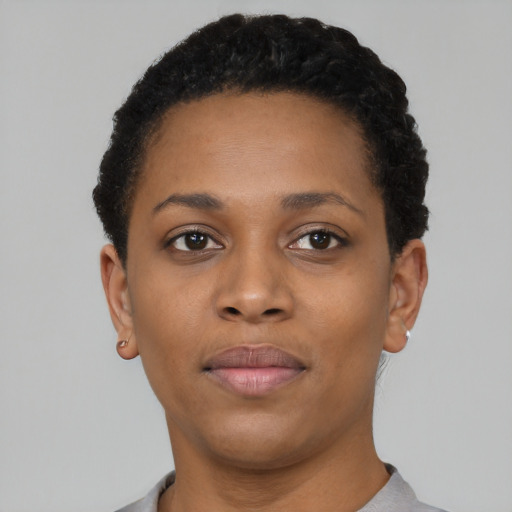 Neutral black young-adult female with short  brown hair and brown eyes