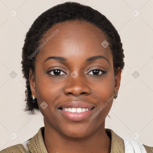 Joyful black young-adult female with short  brown hair and brown eyes