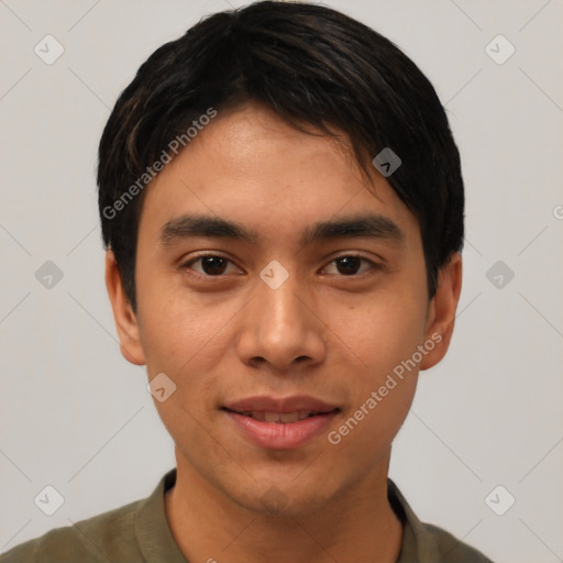 Joyful asian young-adult male with short  black hair and brown eyes