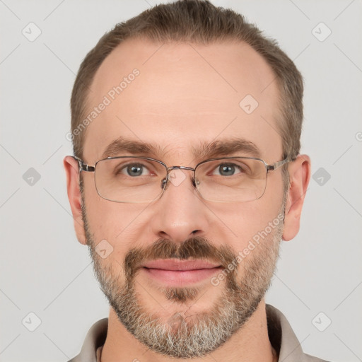 Joyful white adult male with short  brown hair and grey eyes