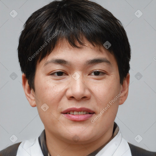 Joyful asian young-adult male with short  brown hair and brown eyes