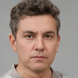 Neutral white adult male with short  brown hair and brown eyes