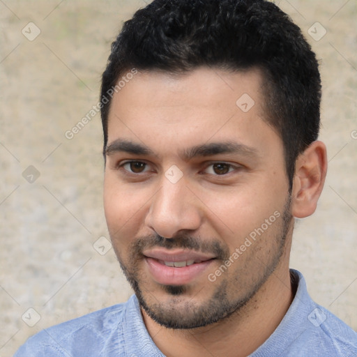 Joyful white young-adult male with short  black hair and brown eyes