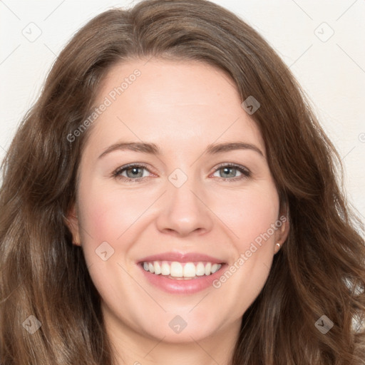 Joyful white young-adult female with long  brown hair and green eyes