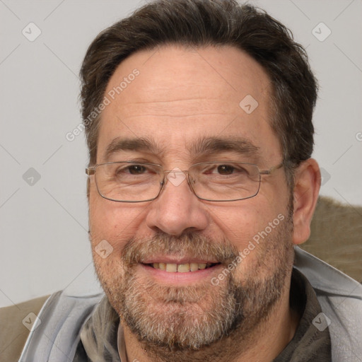 Joyful white middle-aged male with short  brown hair and brown eyes