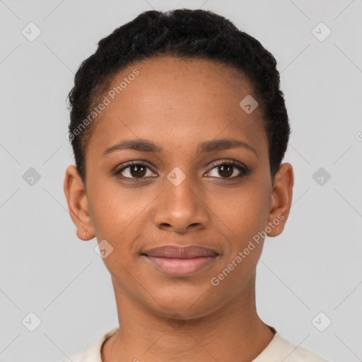 Joyful black young-adult female with short  brown hair and brown eyes