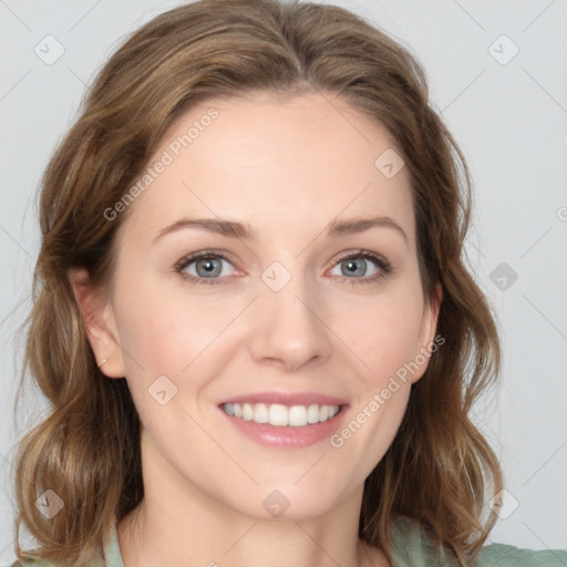 Joyful white young-adult female with medium  brown hair and green eyes