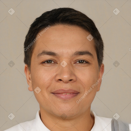 Joyful white adult male with short  brown hair and brown eyes