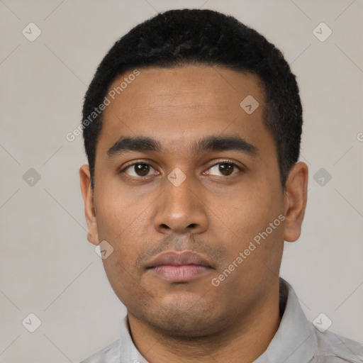 Neutral latino young-adult male with short  black hair and brown eyes