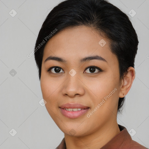 Joyful asian young-adult female with medium  black hair and brown eyes