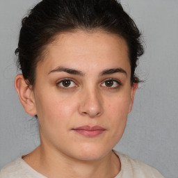 Neutral white young-adult female with short  brown hair and brown eyes