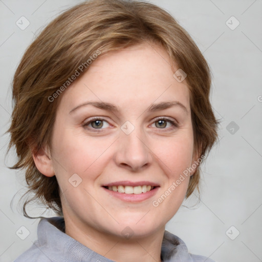 Joyful white young-adult female with medium  brown hair and blue eyes