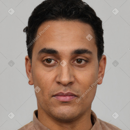 Neutral latino young-adult male with short  black hair and brown eyes