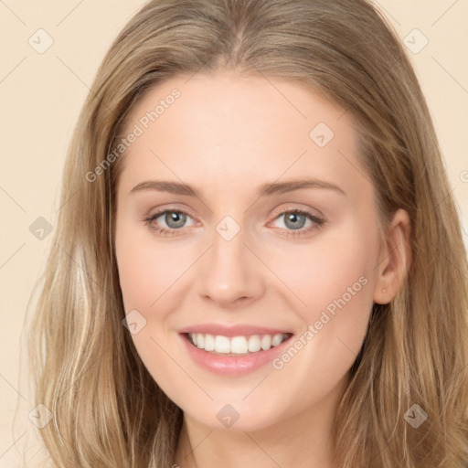 Joyful white young-adult female with long  brown hair and grey eyes