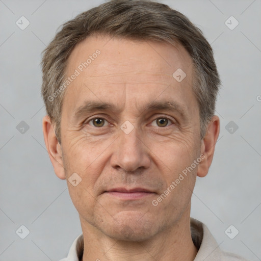 Joyful white middle-aged male with short  brown hair and brown eyes