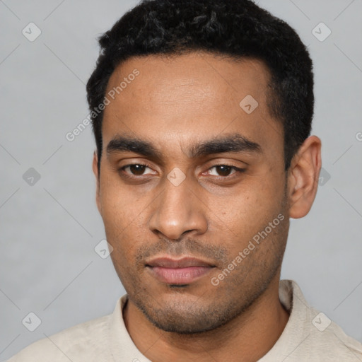 Neutral latino young-adult male with short  black hair and brown eyes