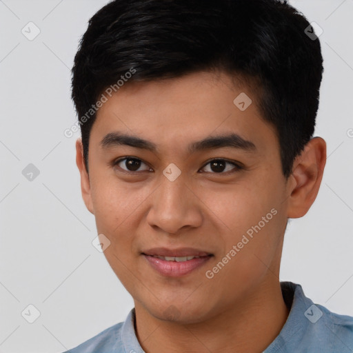 Joyful asian young-adult male with short  black hair and brown eyes