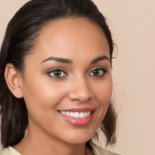 Joyful white young-adult female with medium  brown hair and brown eyes