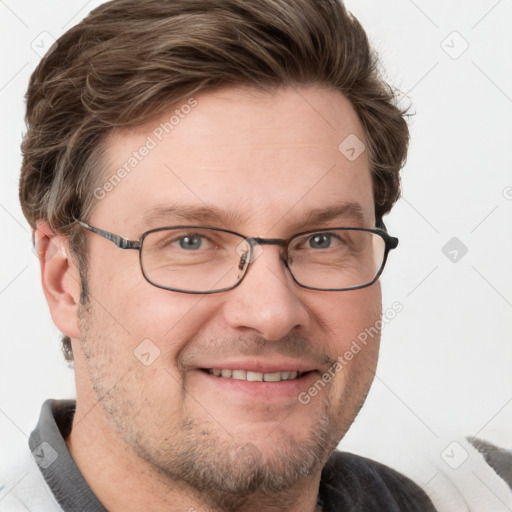 Joyful white adult male with short  brown hair and grey eyes