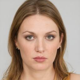 Neutral white young-adult female with medium  brown hair and green eyes