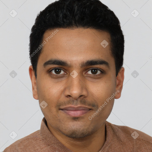 Joyful latino young-adult male with short  black hair and brown eyes