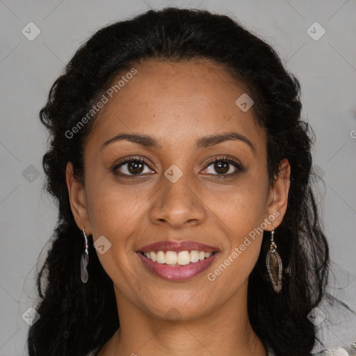 Joyful black young-adult female with long  brown hair and brown eyes