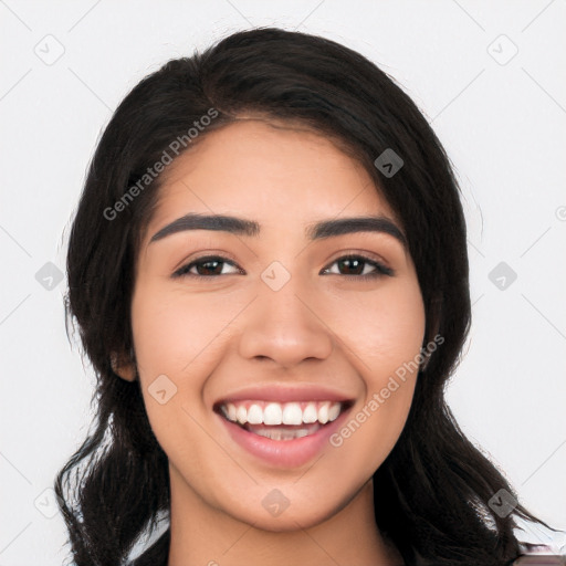 Joyful white young-adult female with long  black hair and brown eyes