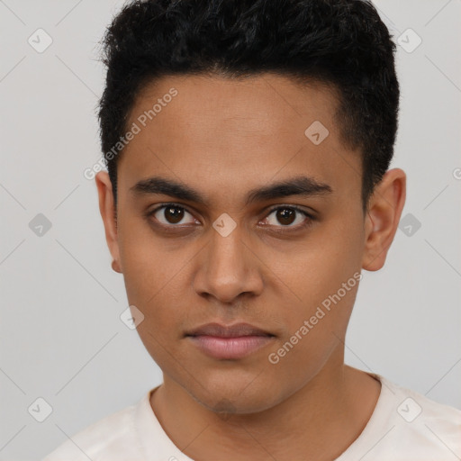 Neutral latino young-adult male with short  brown hair and brown eyes