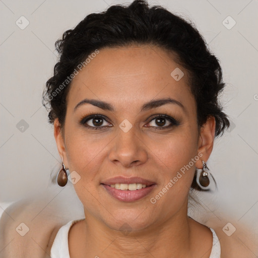 Joyful latino young-adult female with short  brown hair and brown eyes