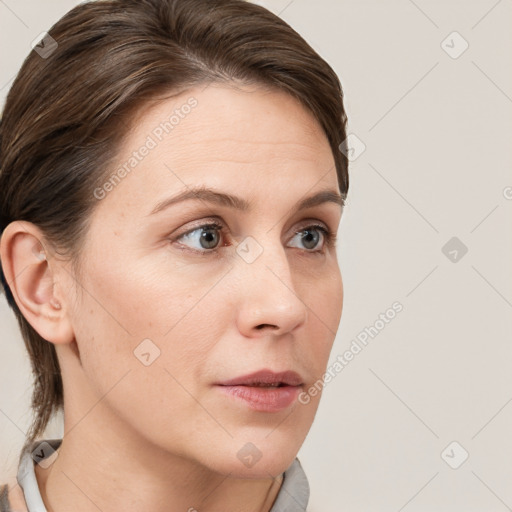 Neutral white young-adult female with short  brown hair and grey eyes