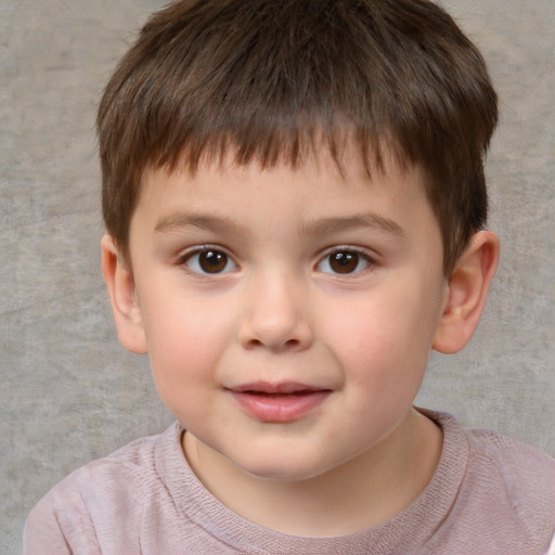 Joyful white child male with short  brown hair and brown eyes