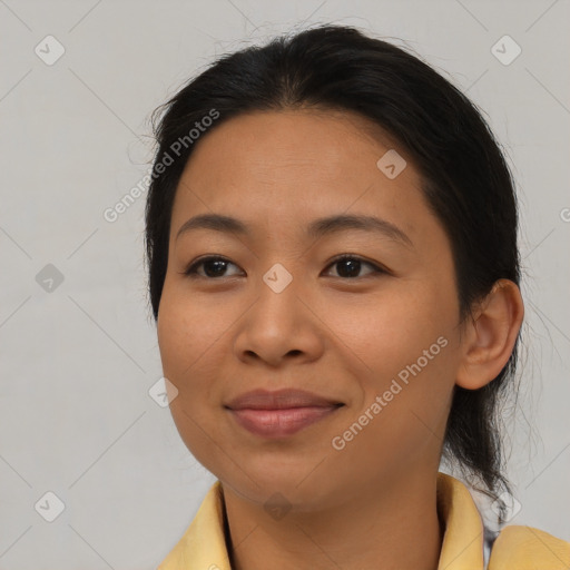 Joyful asian young-adult female with medium  brown hair and brown eyes