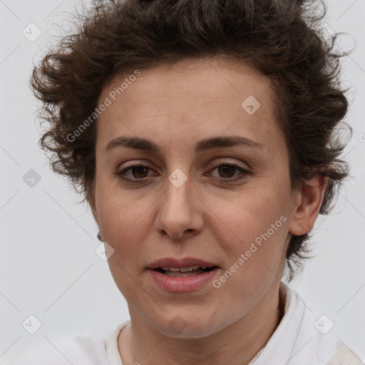 Joyful white adult female with short  brown hair and brown eyes