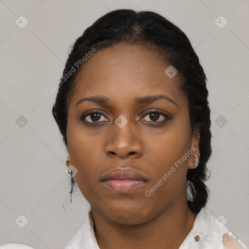 Neutral black young-adult female with medium  black hair and brown eyes