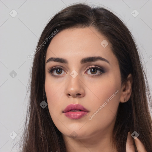 Neutral white young-adult female with long  brown hair and brown eyes