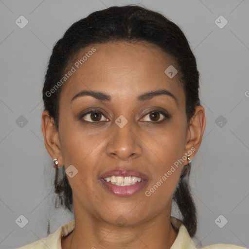 Joyful black young-adult female with medium  brown hair and brown eyes