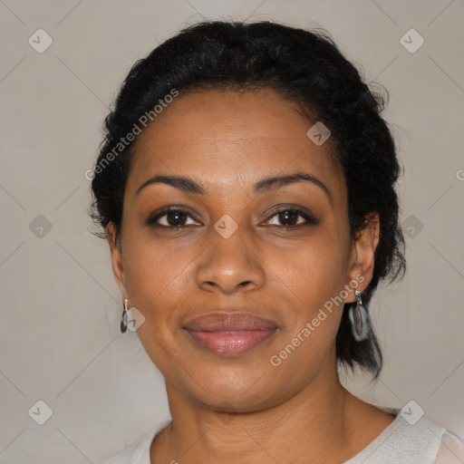 Joyful black adult female with medium  black hair and brown eyes