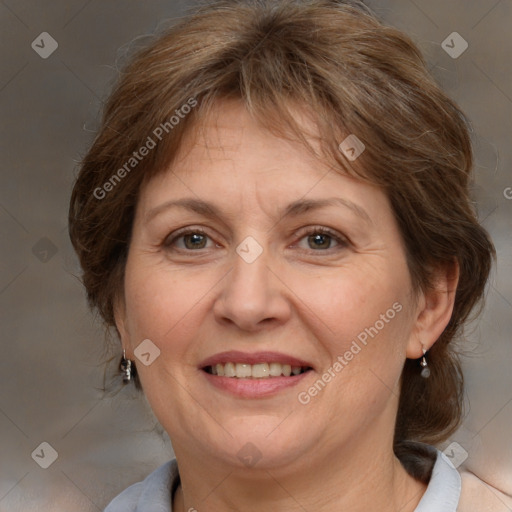 Joyful white middle-aged female with medium  brown hair and brown eyes