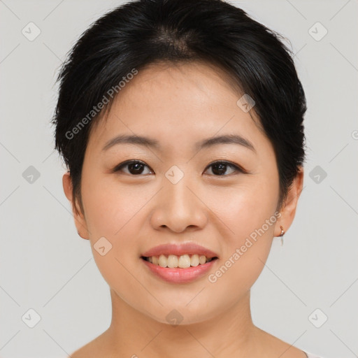 Joyful asian young-adult female with short  brown hair and brown eyes