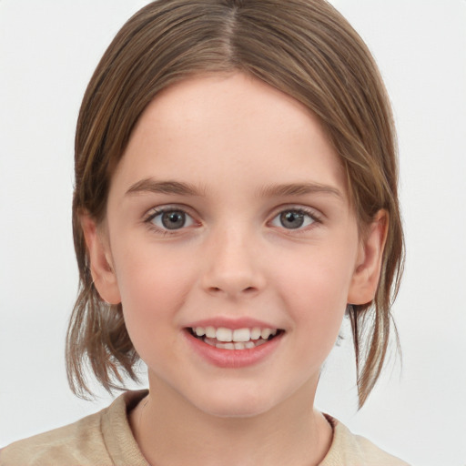 Joyful white child female with medium  brown hair and grey eyes