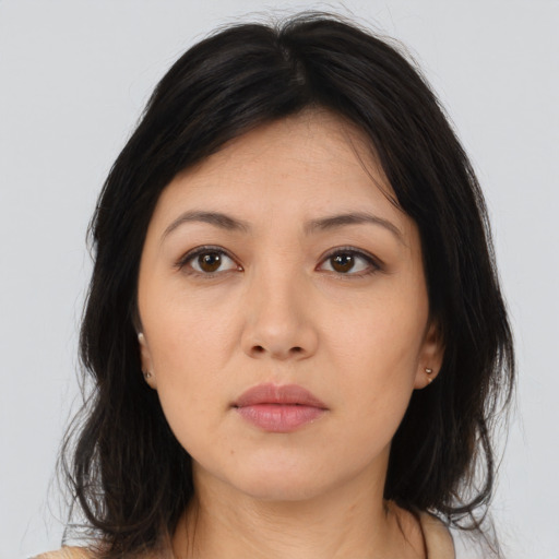 Neutral asian young-adult female with medium  brown hair and brown eyes