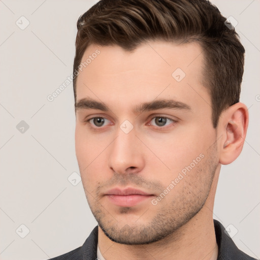 Neutral white young-adult male with short  brown hair and brown eyes