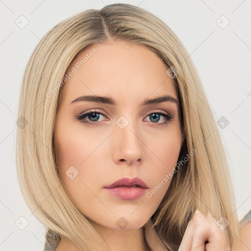 Neutral white young-adult female with long  brown hair and brown eyes