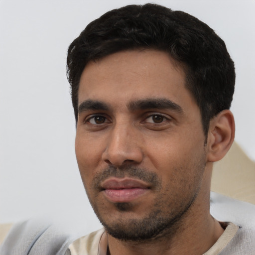 Neutral latino young-adult male with short  black hair and brown eyes