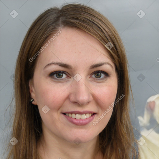 Joyful white young-adult female with long  brown hair and green eyes